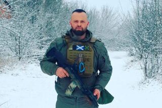 Адам Енніс